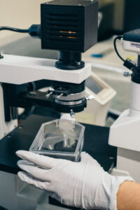 diagnostic-lab-hand-with-glove-holding-tools.jpg